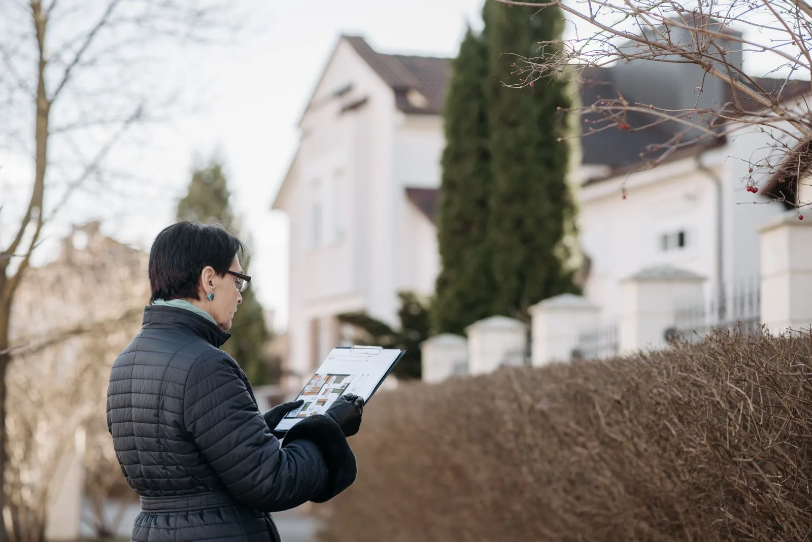 Professional reviewing a residential property