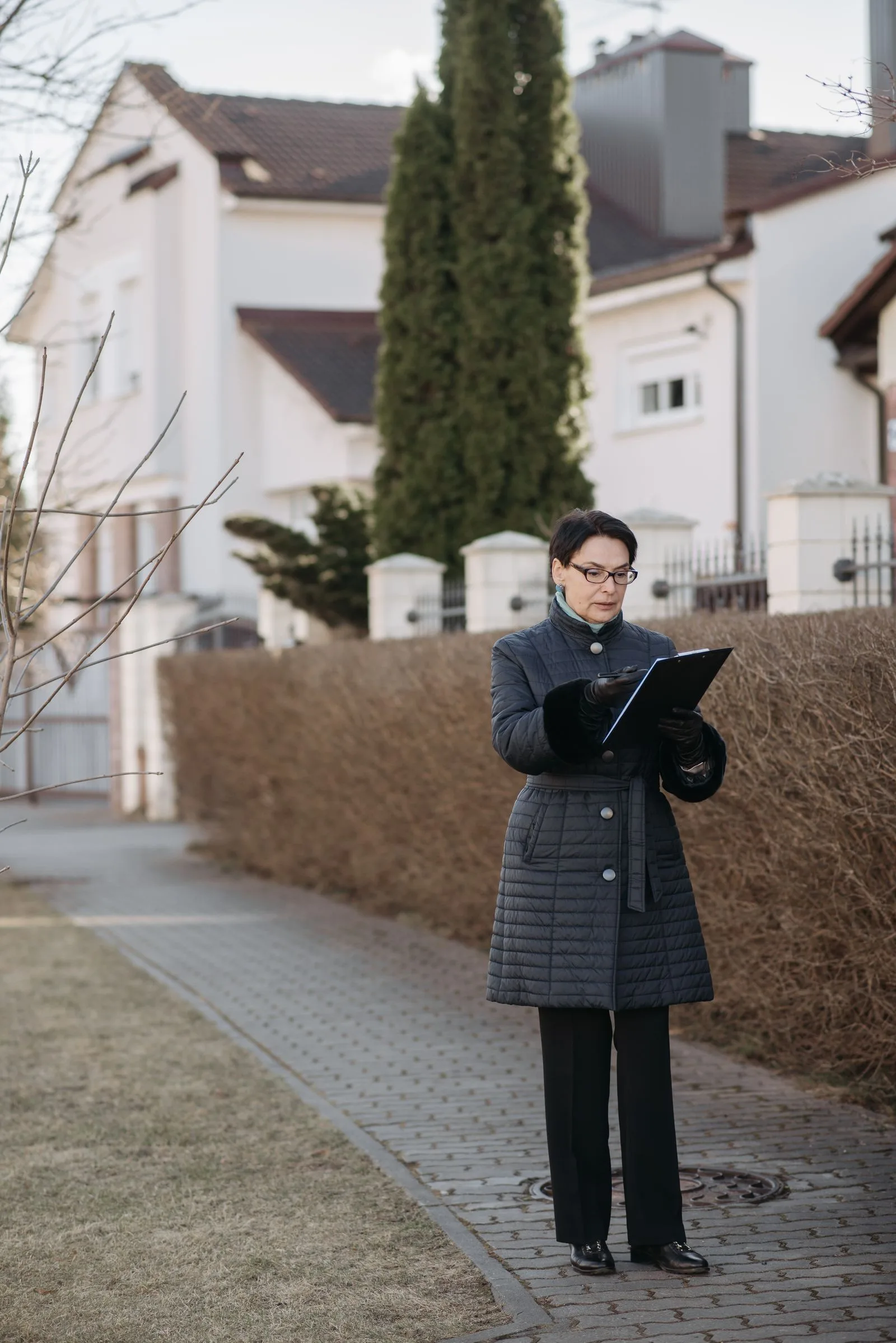 Professional reviewing a residential property