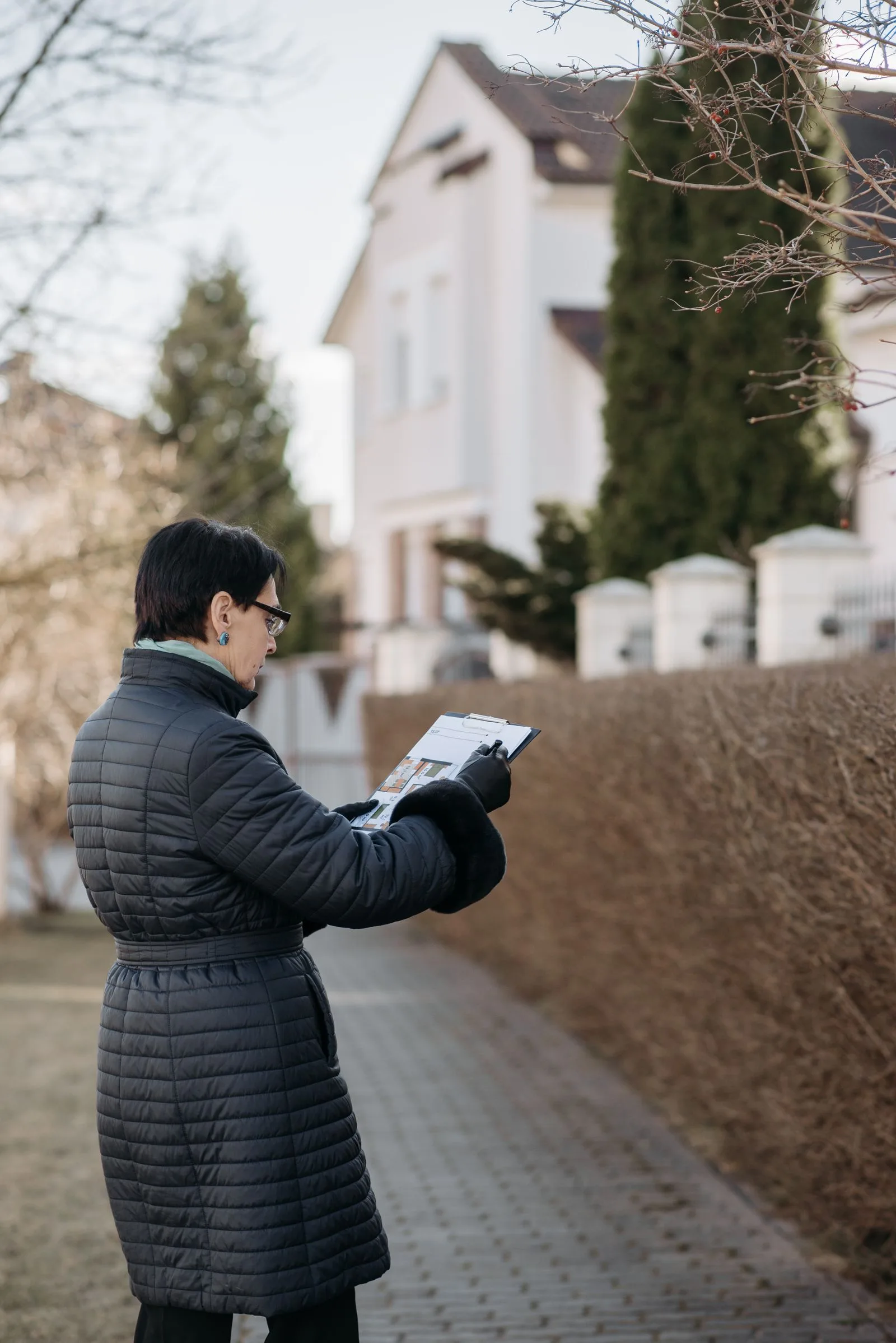 Professional reviewing a residential property
